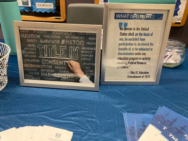 Title IX sign on table