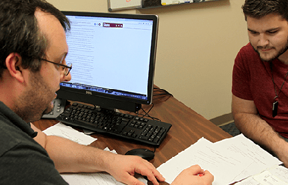 Professor advising student