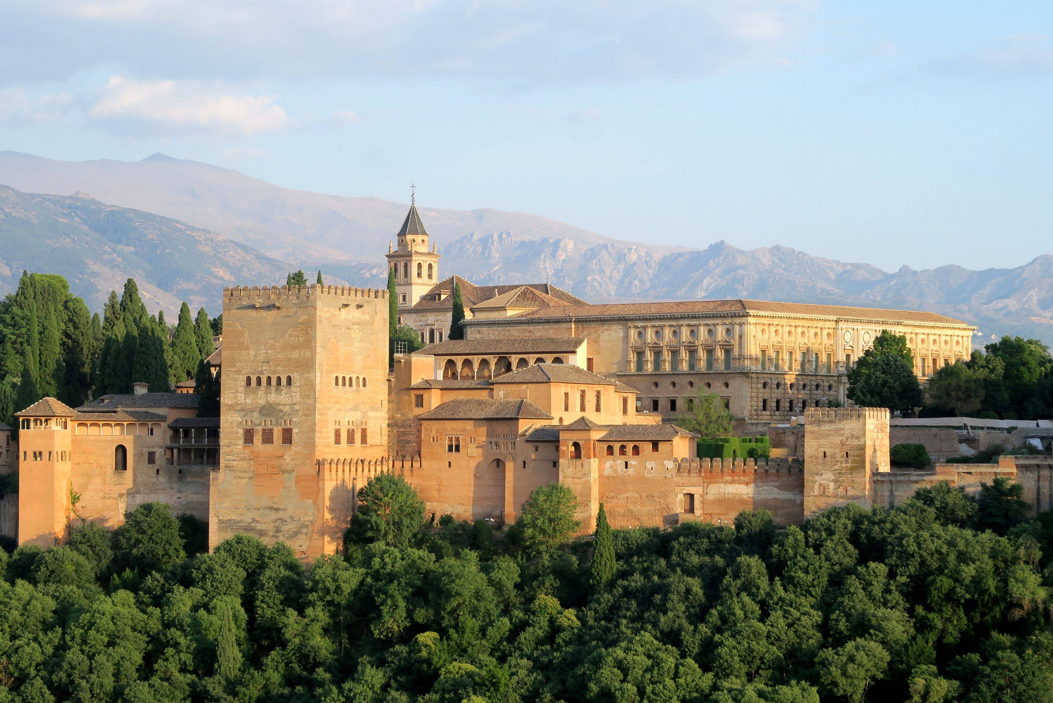 old buildings sit upon a hill